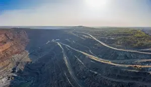 Extraction of minerals with the help of special equipment in the warm evening light in picturesque Ukraine