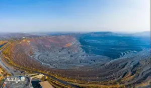 Conveyor Prints: Extraction of minerals with the help of special equipment in the warm evening light in picturesque Ukraine