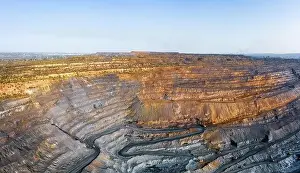 Extraction of minerals with the help of special equipment in the warm evening light in picturesque Ukraine