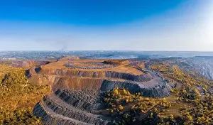 Extraction of minerals with the help of special equipment in the warm evening light in picturesque Ukraine