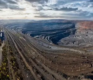 Conveyor Prints: Extraction of minerals with the help of special equipment in the warm evening light in picturesque Ukraine
