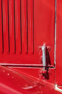 Mechanic Prints: Extreme close-up of a restored classic automobile exterior featuring glossy red paint