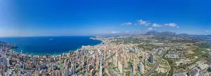 Extremely wide angle panoramic aerial photo of the city of Benidorm in Spain showing a panoramic drone view of