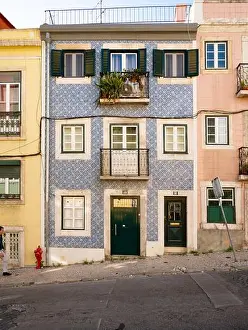 Townhouse Prints: The façade to a traditionally tiled town house on the steep hill streets of the Portuguese capital of Lisbon