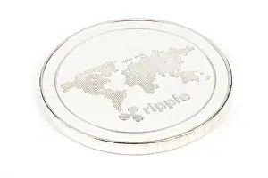 Ripple Prints: Face of the crypto currency silver ripple isolated on white background