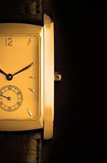 White Work Prints: Face of watch close-up over black background