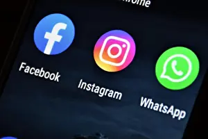 Stressful Prints: Facebook, Instagram and Whatsapp icons on monitor screen