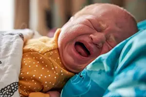 Slumber Prints: The facial expressions of a new born baby girl