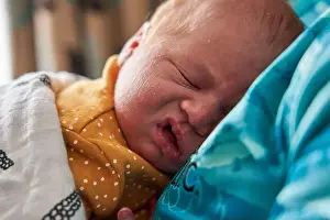 Slumber Prints: The facial expressions of a new born baby girl