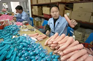 Factories Prints: factory worker in sex toy factory shaki in shenzhen china asia This sex toy factory located in the industrial area of