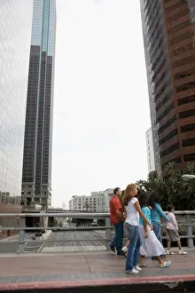 Sibling Prints: Family crossing bridge in downtown Los Angeles