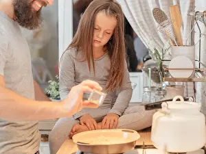 Caring Prints: family culinary class father daughter cooking