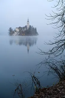 Slavic Prints: The famous Island church enshrouded in mist over Lake Bled