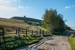 Moorlands Prints: The famous Lancashire landmark of Rivington Pike Chorley UK in the morning sunshine a favourite with walkers from far