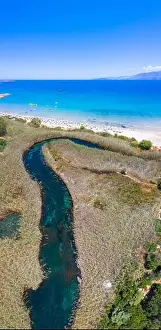 Famous sandy beach of Almyros and the river near Agios Nikolaos, Crete, Greece