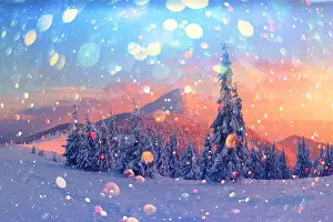 Fantastic orange winter landscape in snowy mountains glowing by sunlight. Dramatic wintry scene with snowy trees