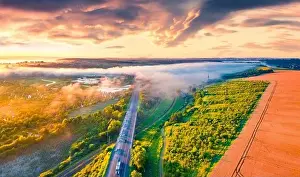 Ternopil Prints: Fantastic summer sunrise on Ternopil outskirts with asphalt road