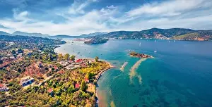 Poros Prints: Fantastic summer view of Plaka beach and Poros town on background
