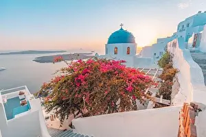 Fantastic sunset landscape of famous travel and vacation destination. Luxury summer adventure concept. Wonderful view of Oia village Santorini, Greece