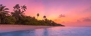 Sunset Beach Prints: Fantastic tranquil closeup view of calm sea water waves with orange sunrise sunset sunlight
