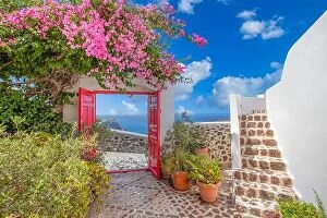 July Collection: Fantastic travel background, Santorini urban landscape. Red door or gate with stairs