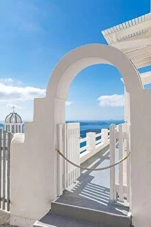 Images Dated 9th October 2019: Fantastic vertical panoramic landscape, white architecture and white door entrance into blue sea