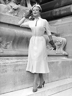 Headpiece Prints: fashion, 1950s, woman in woolen dress, 1950s, Additional-Rights-Clearences-Not Available