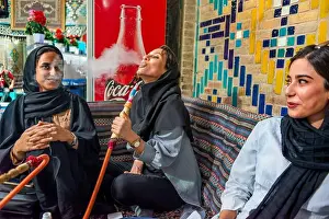 Bazar Prints: Fashion modern iranian women with a water pipe inisde Vakil Tea House inside the bazaar Ganjali Khan Bazaar