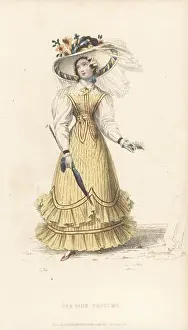 Mode Prints: Fashionable woman in sea-side costume walking on the beach
