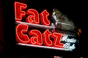 Neon Sign Prints: Fat Catz Music Club neon sign at night in New Orleans, Louisiana
