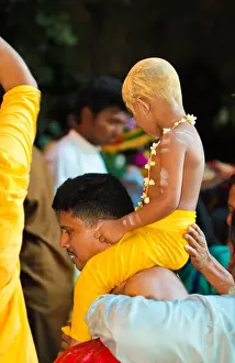 Hindu Religion Prints: A father carrying his son cllimbing the Batu Cave temple