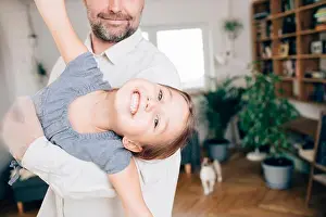 4 5 Years Prints: Father playing with daughter, pretending to fly