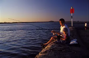 Sea Water Prints: Father and son fishing