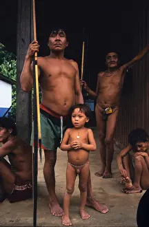 Weaving Prints: Fathers and sons, Yanomami Indians in Molaca communal dwelling