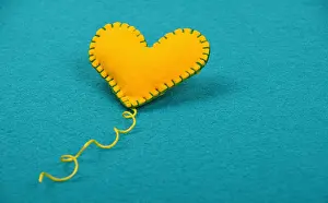 Handcraft Prints: Felt craft and art yellow heart, thread on blue