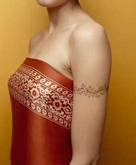 Flesh Prints: Female arm tattoo in henna