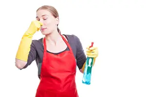 Workwear Prints: Female maid being disgusted by aweful smell while cleaning the house
