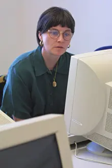 Pupils Prints: Female Mature student in computer class at college north London GB UK