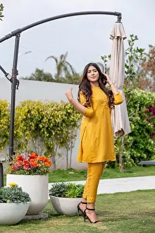 Studio Shoot Prints: Female model posing outdoors wearing summer dress Indian Pakistani Asian traditional salwar kameez