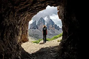 European Alps Prints: A female person admiring the view of Tre Cime di Lavaredo mountain in the Dolomites