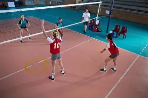 Hobbies Prints: Female volleyball players playing volleyball in the court