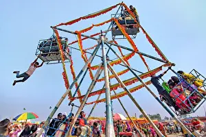 Ferris Wheel Prints: Ferris wheel, Nagordola in a traditional village fair in Bogra