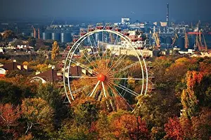 Drone Landscape Prints: Ferris wheel and roofs of houses in the autumn park from a bird's eye view