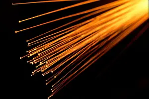 Optics Prints: Fiber Optic Strands aglow transmitting light images through transparent fibers