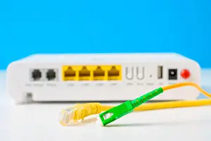 Connector Prints: Fiber optical and network cables with internet wireless router on blue background