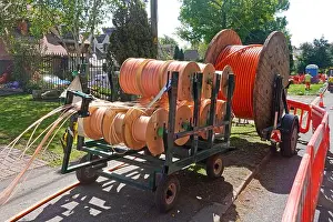 Essex Prints: Fibre optic super fast broadband infrastructure project in rural Essex village cables on drums for laying in new