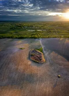 Fields of Mazury in sunset light from drone, Poland