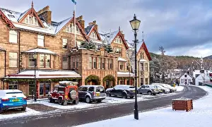 Highlands Prints: Fife Arms Hotel Braemar Scotland winter and the building and pavements covered by snow