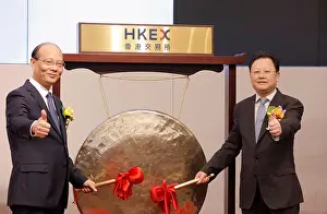 Volkswagen Prints: FILE--Li Liangbin, right, Chairman and President of Ganfeng Lithium
