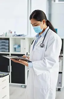 Clipboard Prints: Filling out a patients covid card